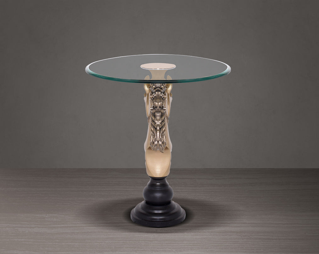 This vintage end table in gold finish aluminium base with horse head design motif with back view