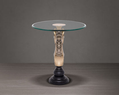 This vintage end table in gold finish aluminium base with horse head design motif with back view