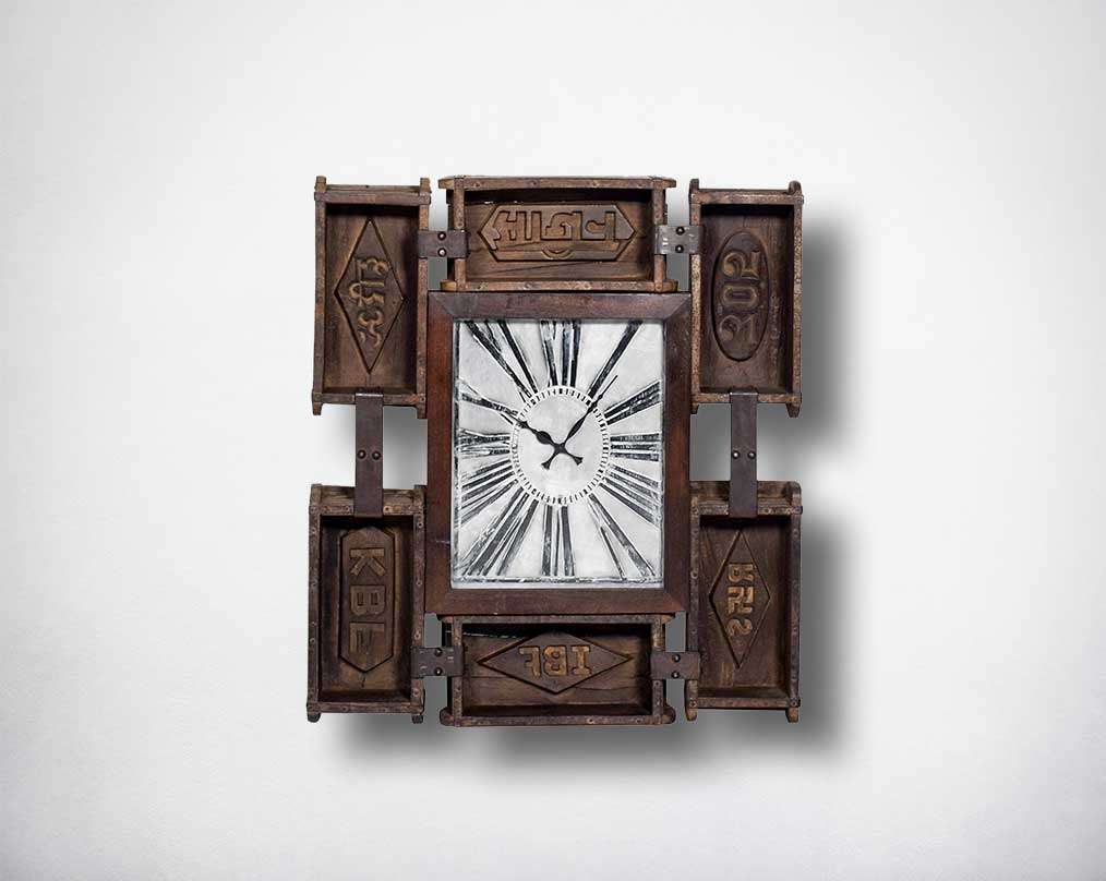 Square wall clock in recycle brick and mould antique finish.