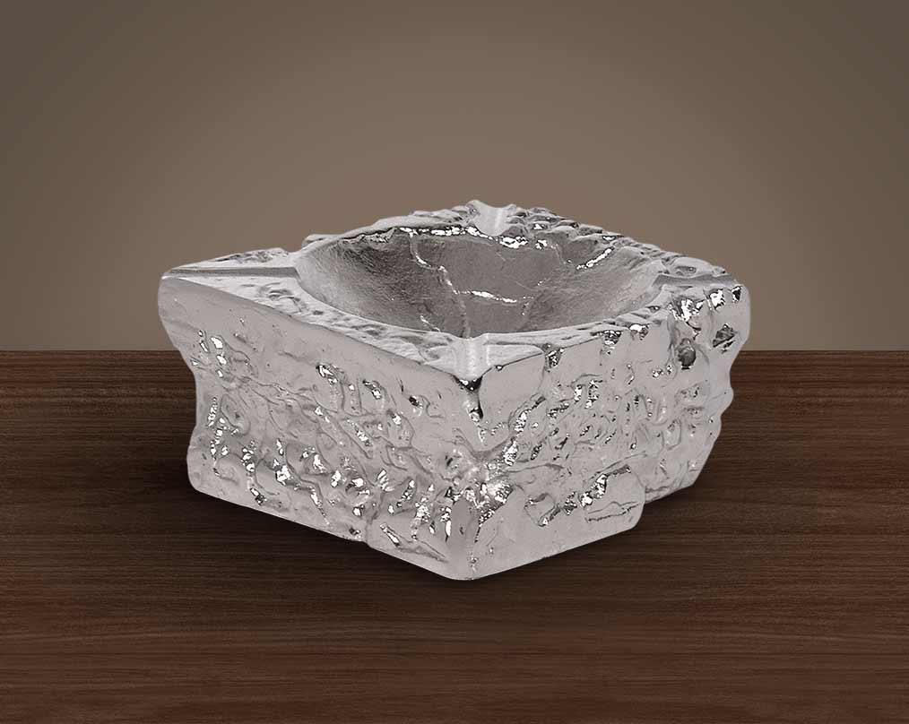 Nickel coated aluminium ashtray.