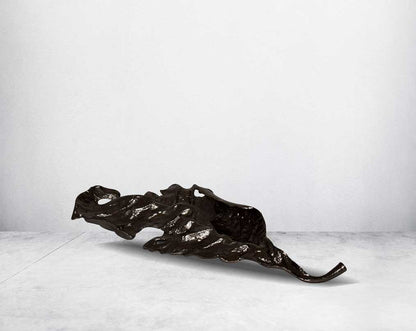 A gorgeous way to add artistry to a coffee or dining table, this decorative leaf makes for a stunning statement in any home small