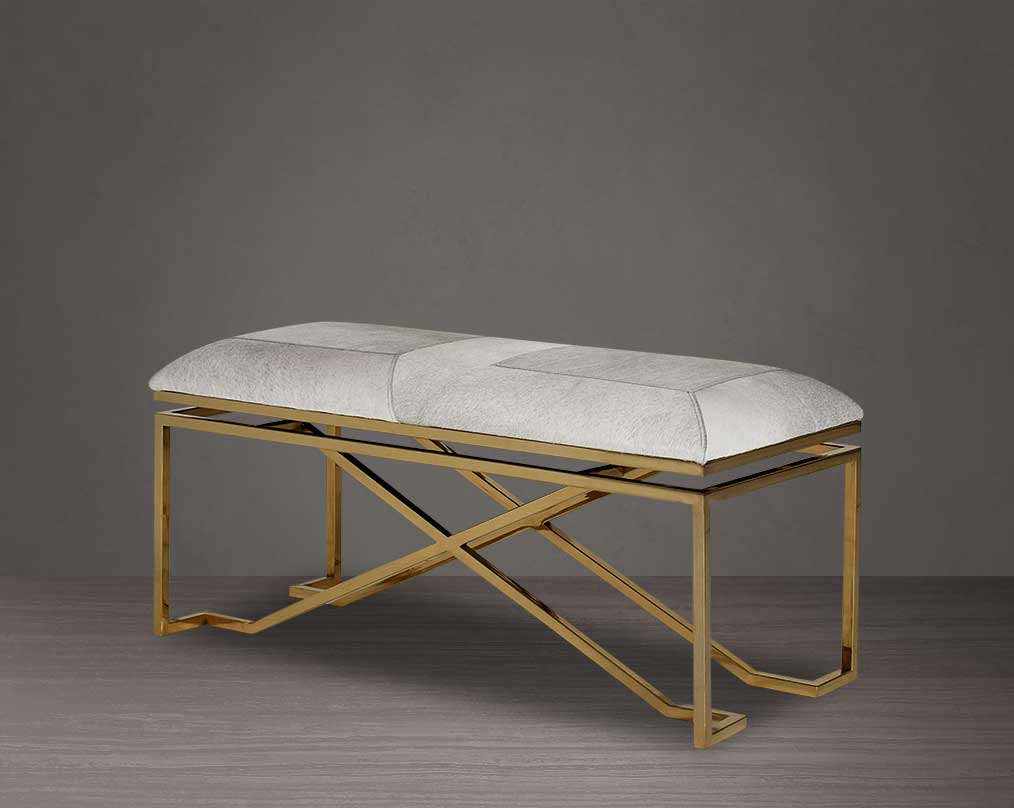 Double bench upholstered in light grey hide seat and high polished gold stainless steel legs in a contemporary, cross design.