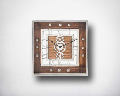 Square wall clock in aluminium and wood in natural finish with roman numerals.