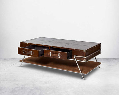 The table has 2 drawers with stainless steel legs. End table in vintage brown luxurious leather and stainless steel rivets with openable top and base in suede with stainless steel legs.