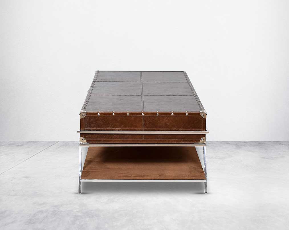 The table has 2 drawers with stainless steel legs. End table in vintage brown luxurious leather and stainless steel rivets with openable top and base in suede with stainless steel legs.