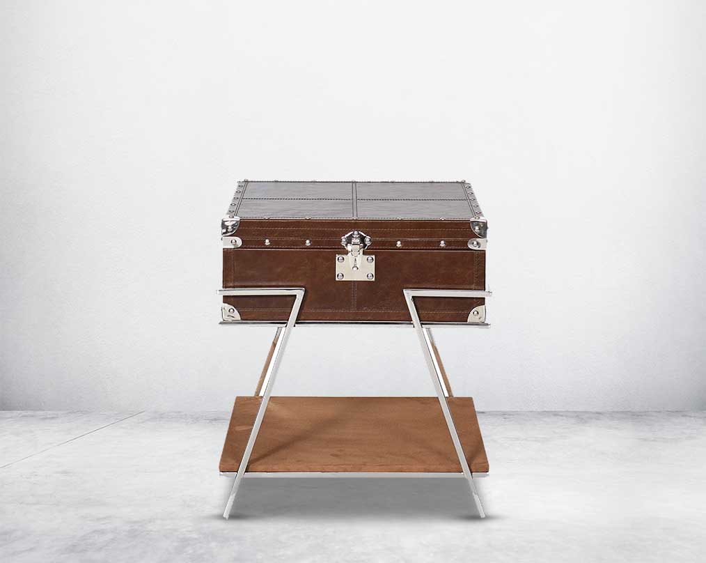 Coffee table with low height in vintage brown luxurious leather and stainless steel rivets top and base in suede.