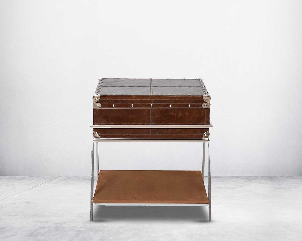 Coffee table with low height in vintage brown luxurious leather and stainless steel rivets top and base in suede.
