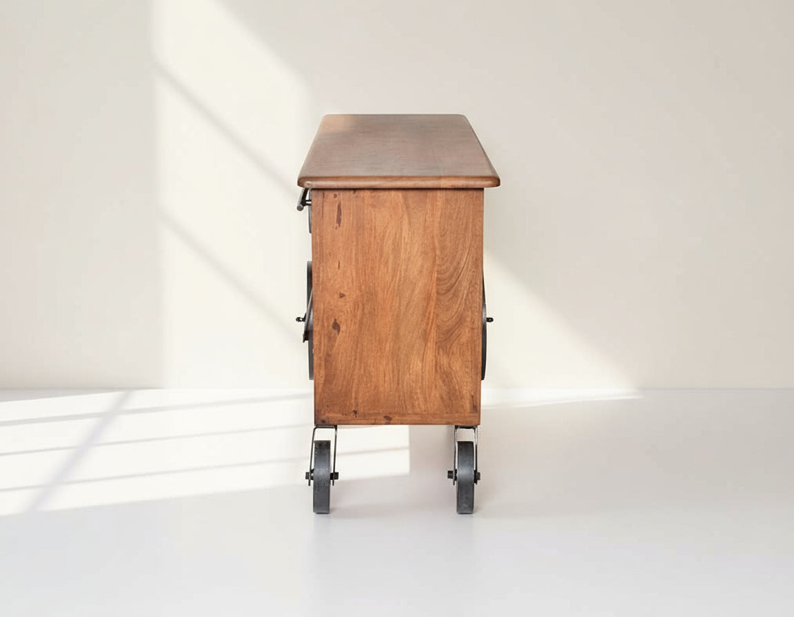 Wine cart/ bar with a vintage look in mango wood and powder-coated iron wheels with storage.
