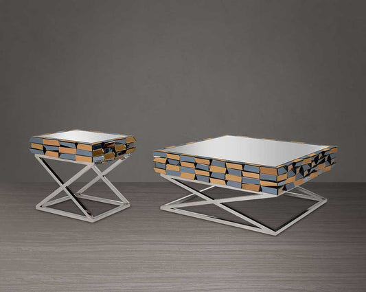 Coffee table with a transparent glass top, a mirror in shades of grey and tawny, and highly polished, cross-shaped stainless steel legs. End table with a transparent glass top, a mirror in shades of grey and tawny, and highly polished, cross-shaped stainl