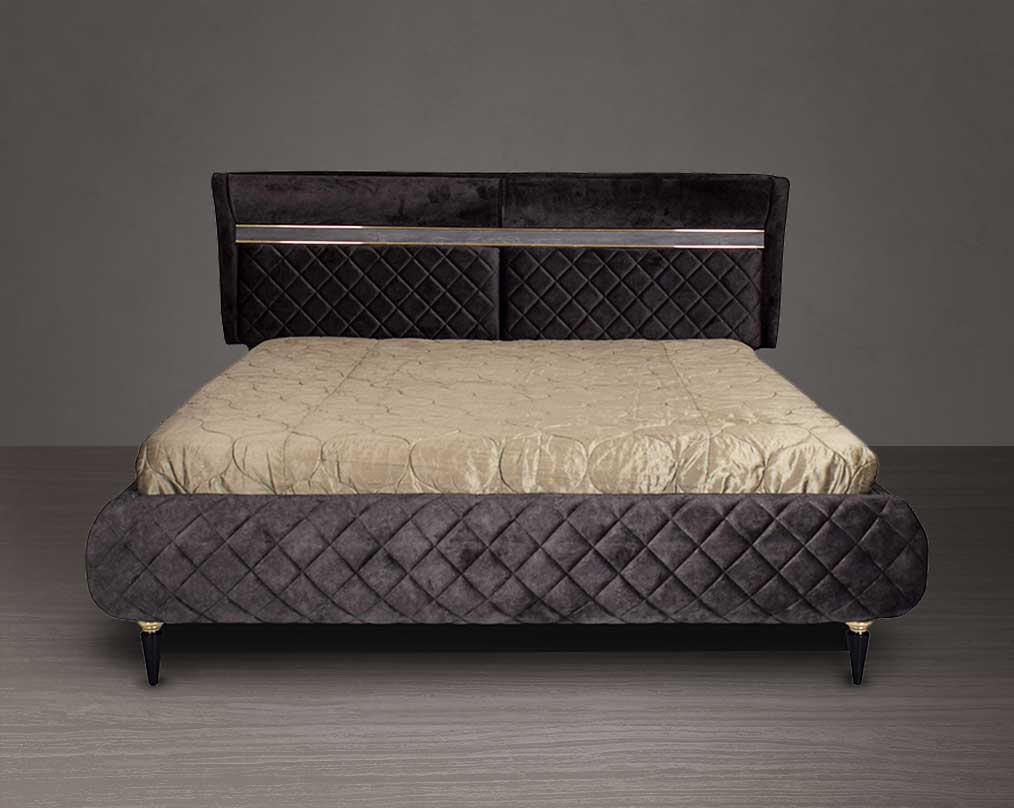 High back bed in king size in dark oak upholstered & quilted in fabric with antique gold design motif in modern classic design. The bed comes with hydraulic lift storage.