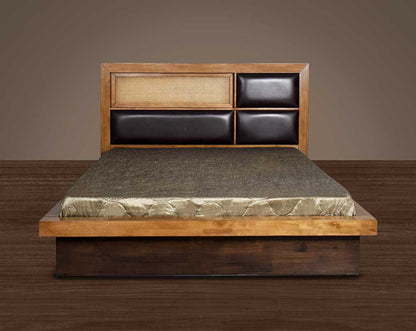 This luxurious king-size bed adds a natural & rustic opulent style to your space. It has a high headboard finished in antique oak and upholstered in faux leather for added comfort. It also has a bamboo knitted shelf in the headboard & has a hydraulic styl