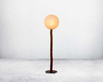 Floor lamp in fibre with wooden stand in balinese design  small