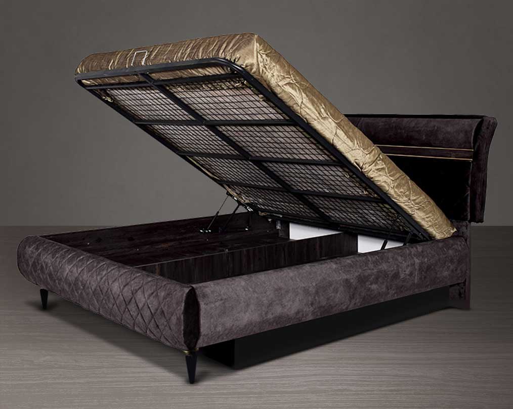 High back bed in king size in dark oak upholstered & quilted in fabric with antique gold design motif in modern classic design The bed comes with hydraulic lift storage.