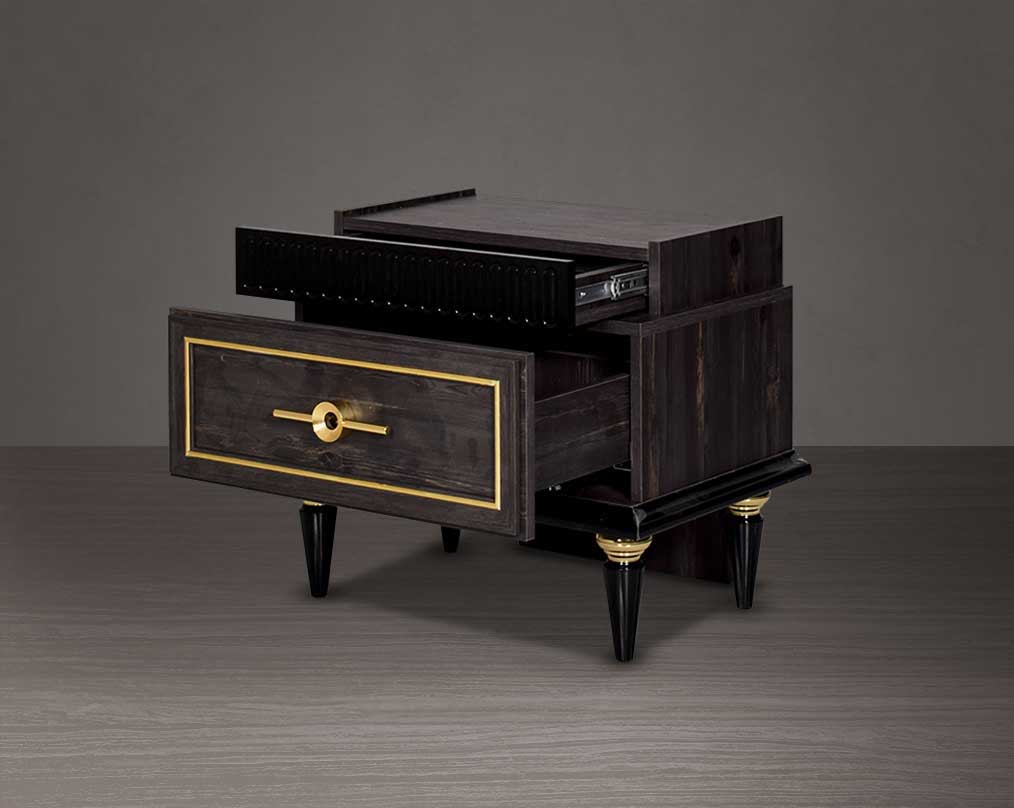 Bedside table in dark oak finish with antique gold design motif and open two drawers with golden handles in modern classic design.