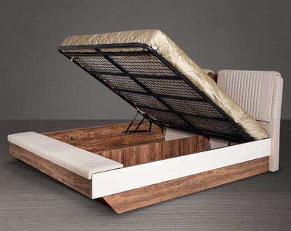 High back bed in king size upholstered in faux leather with hydraulic lift storage in light walnut base.