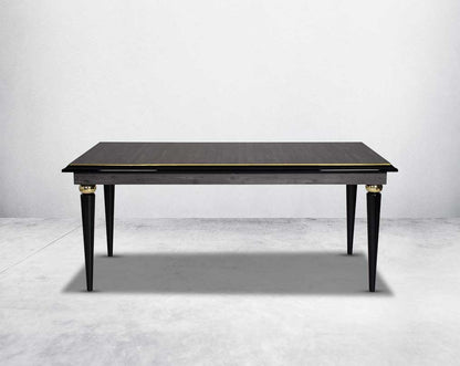 6 seater rectangular dining table in dark oak finish with front view an antique gold rim in wooden legs in modern classic design