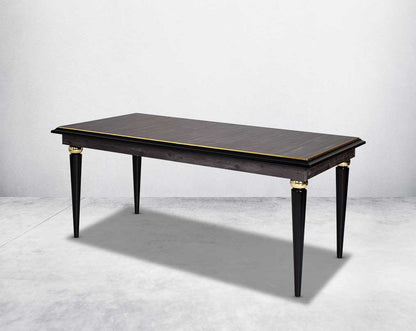 6 seater rectangular dining table in dark oak finish with an antique gold rim in wooden legs in modern classic design