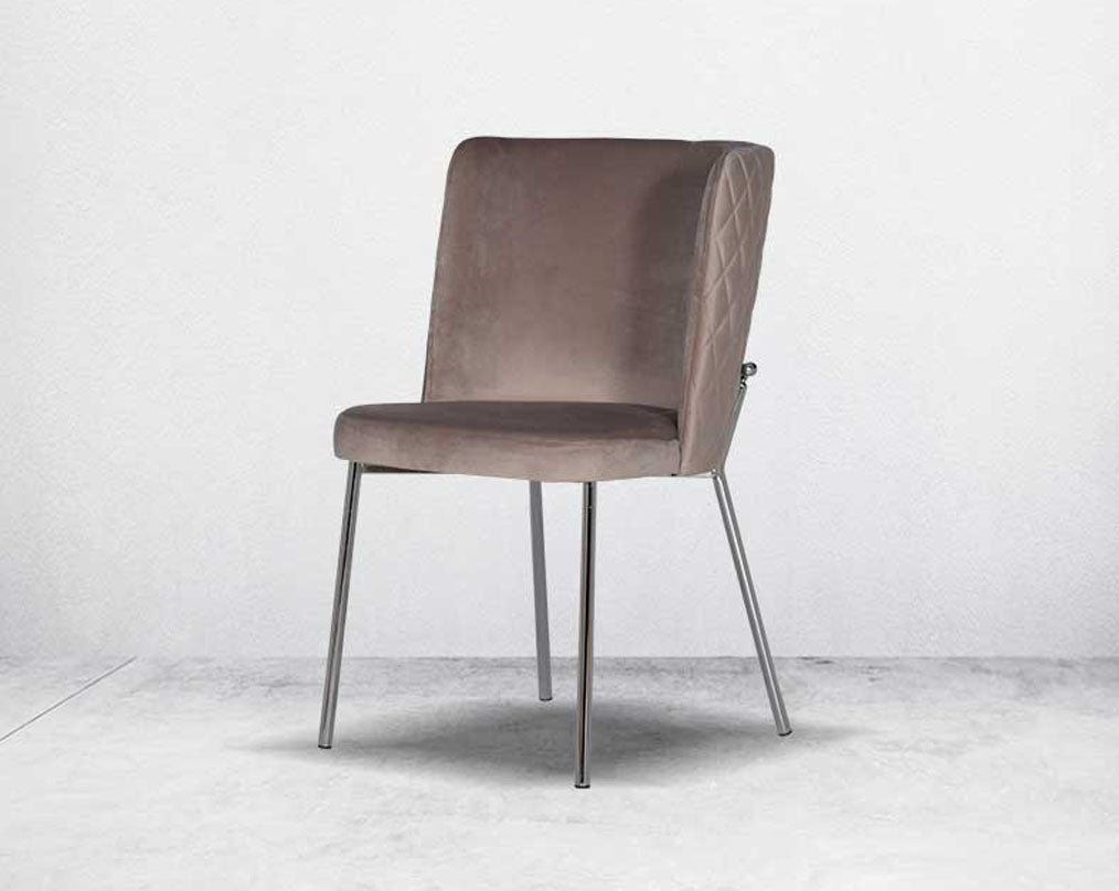 Minimalistically designed chair with criss-cross stitch padded fabric in silver finish stainless steel legs in contemporary design.