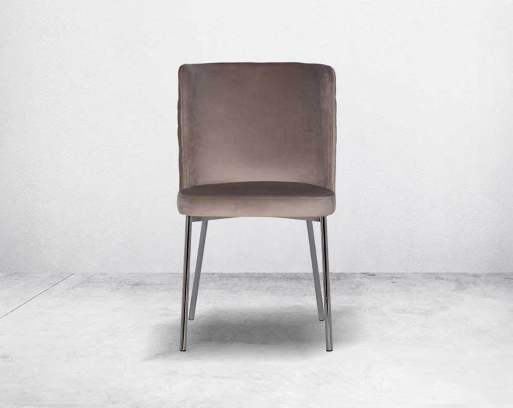 Minimalistically designed chair front  with criss-cross stitch padded fabric in silver finish stainless steel legs in contemporary design.