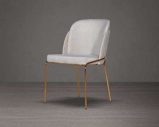 Designed chair with criss-cross stitch padded fabric in gold finish stainless steel legs in contemporary design.