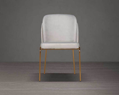 designed chair with front view criss-cross stitch padded fabric in gold finish stainless steel legs in contemporary design.