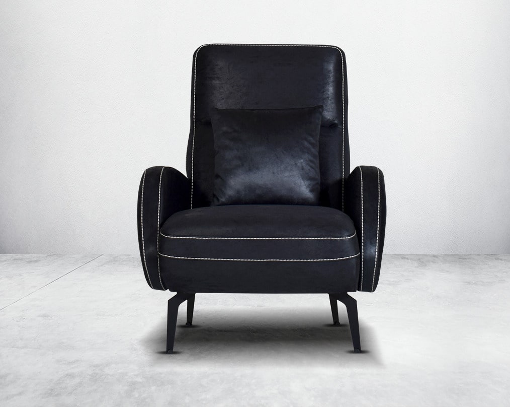 the armchair upholstered in fabric with stainless steel black plated legs in modern classic design.