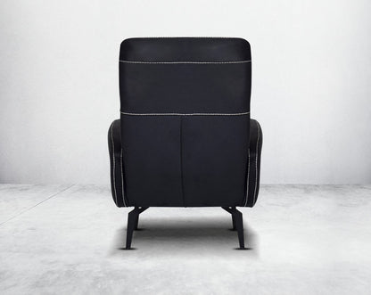 armchair upholstered in fabric with stainless steel black plated legs in modern classic design with  back view