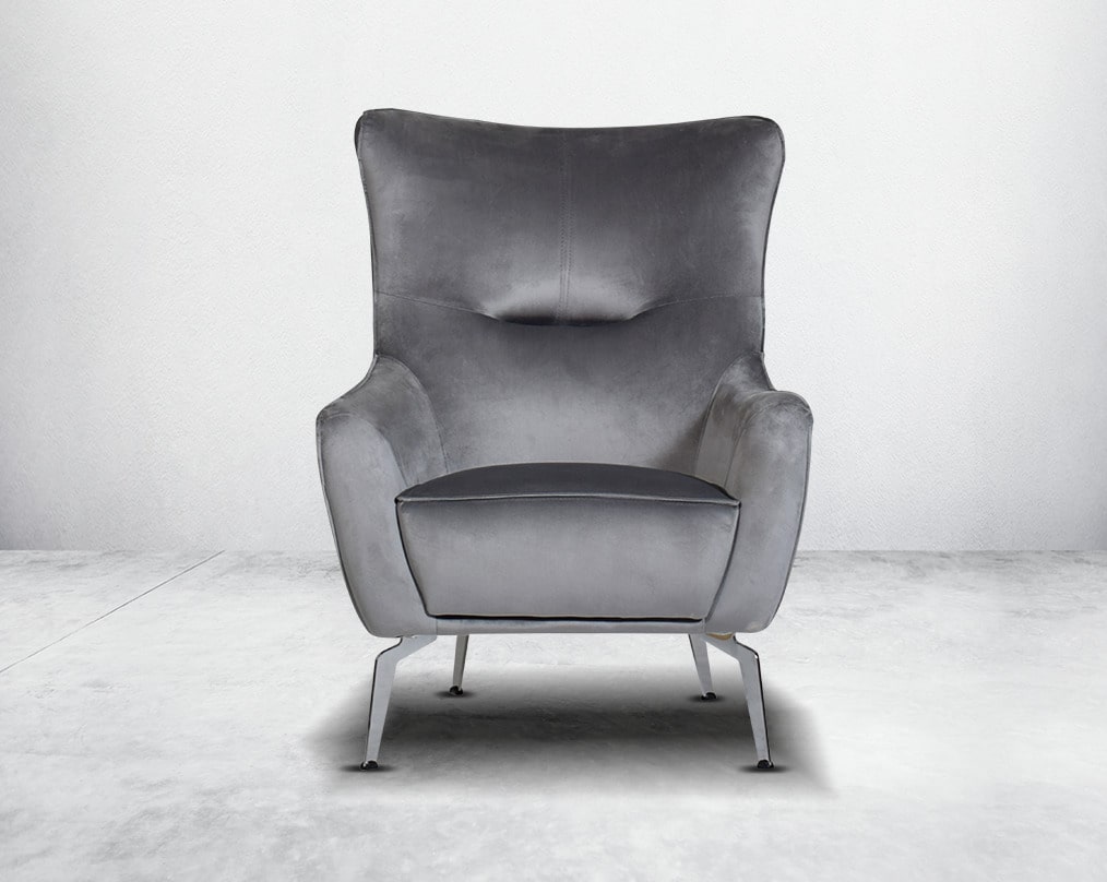 The backrest is reversible which creates more sitting space & can also be used as a sofa bed. The set comes with 1 cushions to compliment it. Beautifully crafted wing armchair upholstered in fabric with tufted back and high gloss stainless steel legs in m