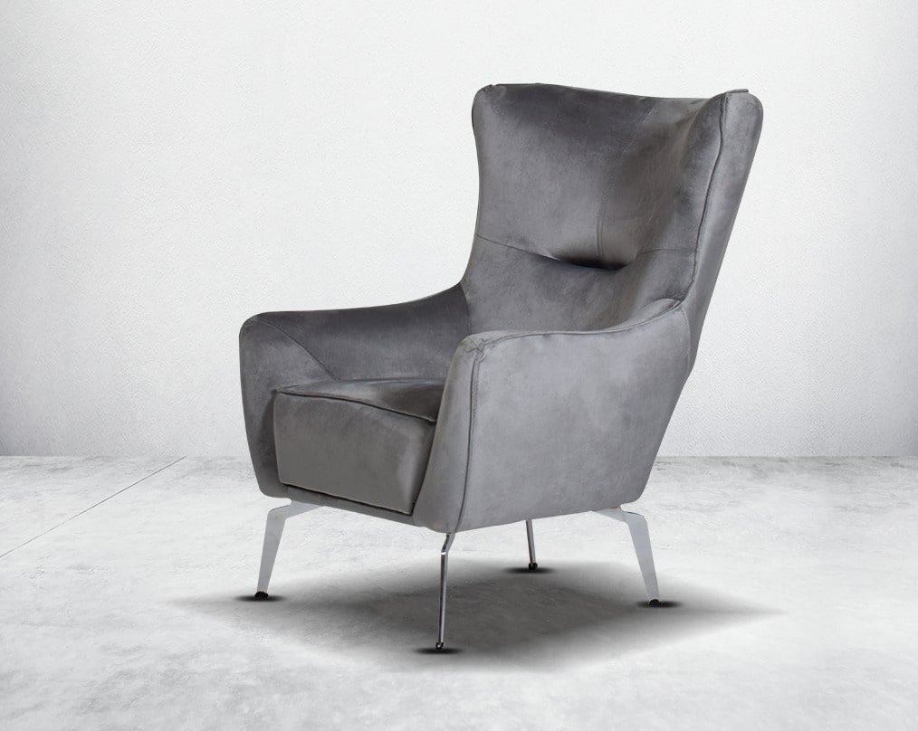 The backrest is reversible which creates more sitting space & can also be used as a sofa bed. The set comes with 1 cushions to compliment it. Beautifully crafted wing armchair upholstered in fabric with tufted back and high gloss stainless steel legs in m