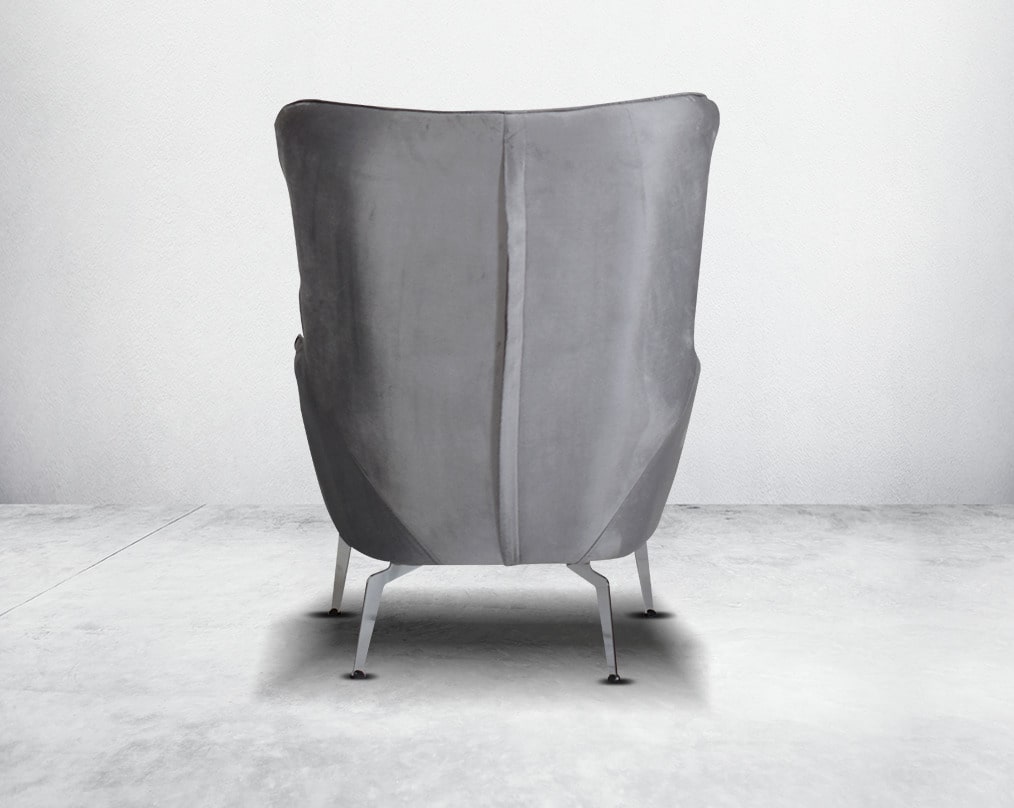 The backrest is reversible which creates more sitting space & can also be used as a sofa bed. The set comes with 1 cushions to compliment it. Beautifully crafted wing armchair upholstered in fabric with tufted back and high gloss stainless steel legs in m