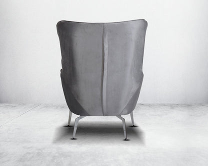 The backrest is reversible which creates more sitting space & can also be used as a sofa bed. The set comes with 1 cushions to compliment it. Beautifully crafted wing armchair upholstered in fabric with tufted back and high gloss stainless steel legs in m