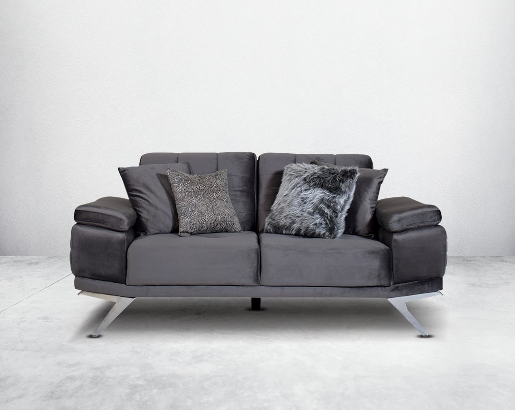 This elegant and sophisticated sofa upholstered in fabric with clean lines, straight shelter arms softened by subtle curves in modern classic design. Horizontal channel quilting is an outstanding  design detailed with high gloss stainless steel base The b