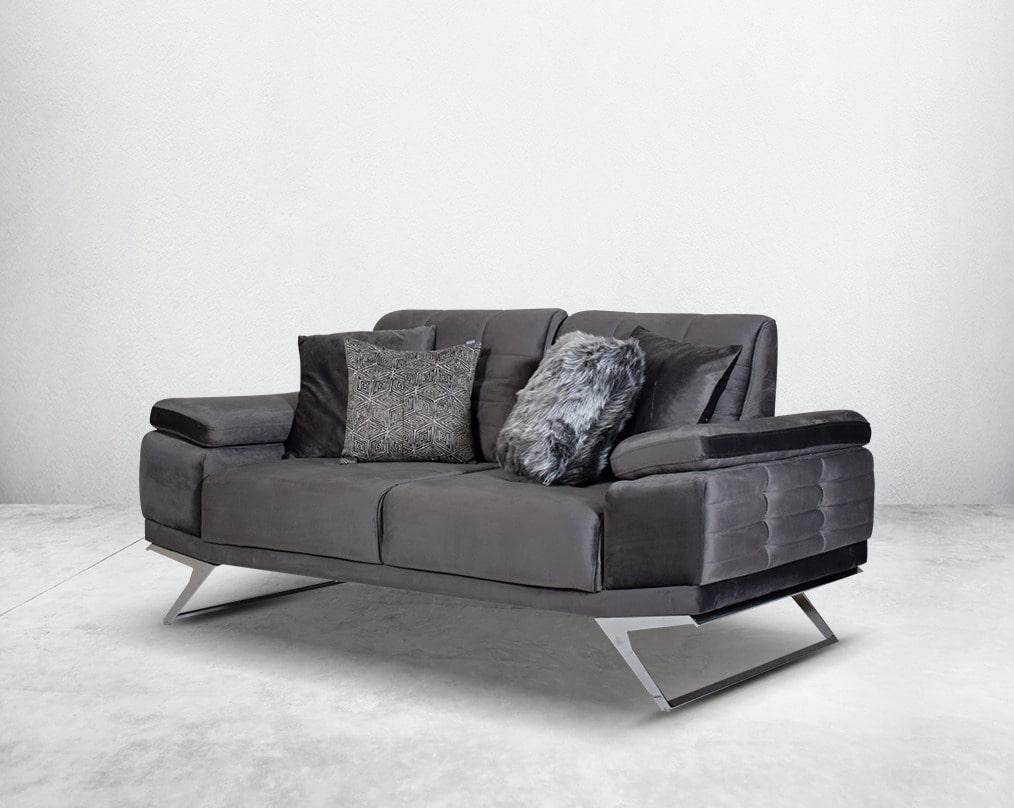The backrest is reversible which creates more sitting space & can also be used as a sofa bed. The set comes with 2 cushions to compliment it. Beautifully crafted wing armchair upholstered in fabric with tufted back and high gloss stainless steel legs in m