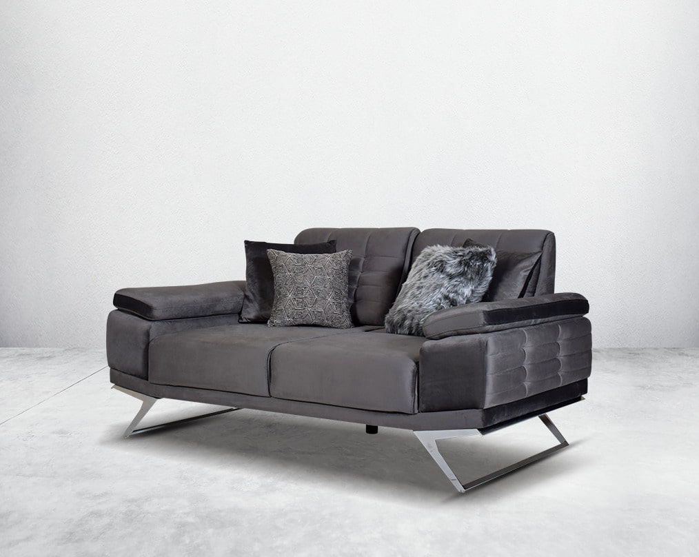 The backrest is reversible which creates more sitting space & can also be used as a sofa bed. The set comes with 2 cushions to compliment it. Beautifully crafted wing armchair upholstered in fabric with tufted back and high gloss stainless steel legs in m