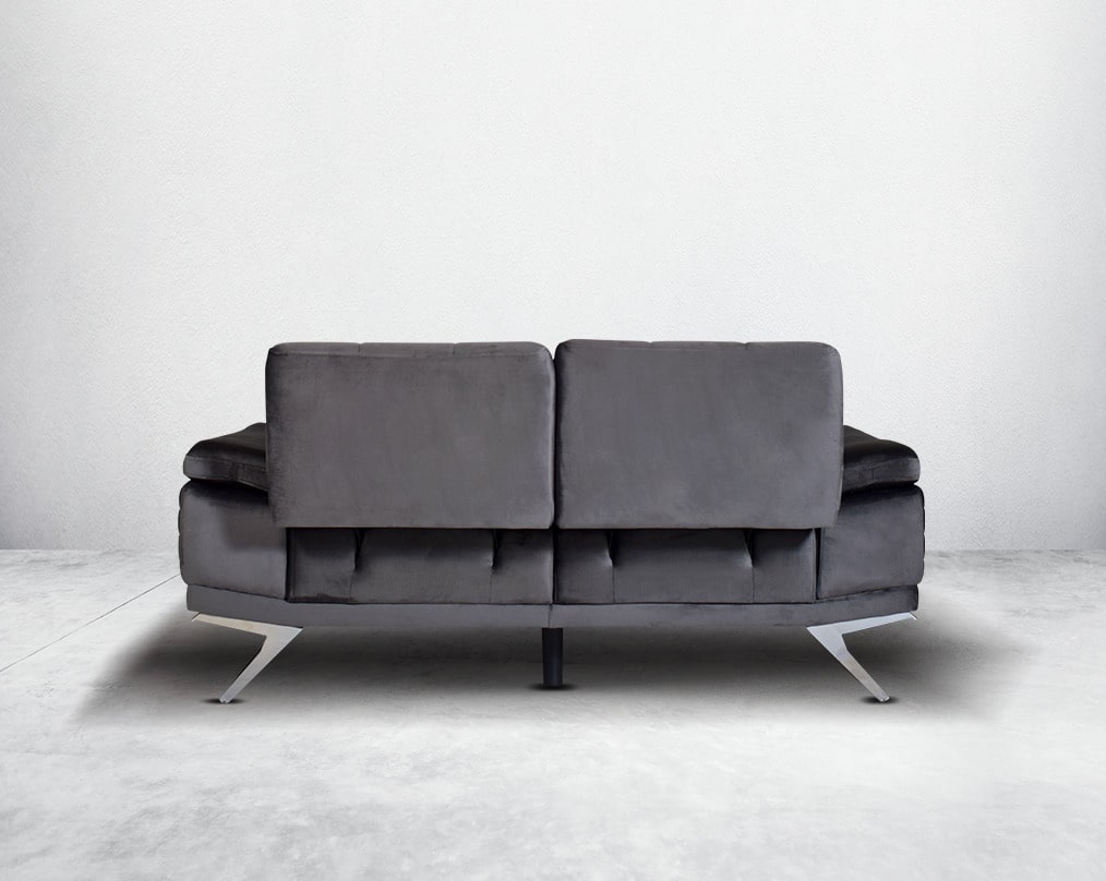 The backrest is reversible which creates more sitting space & can also be used as a sofa bed. The set comes with 2 cushions to compliment it. Beautifully crafted wing armchair upholstered in fabric with tufted back and high gloss stainless steel legs in m