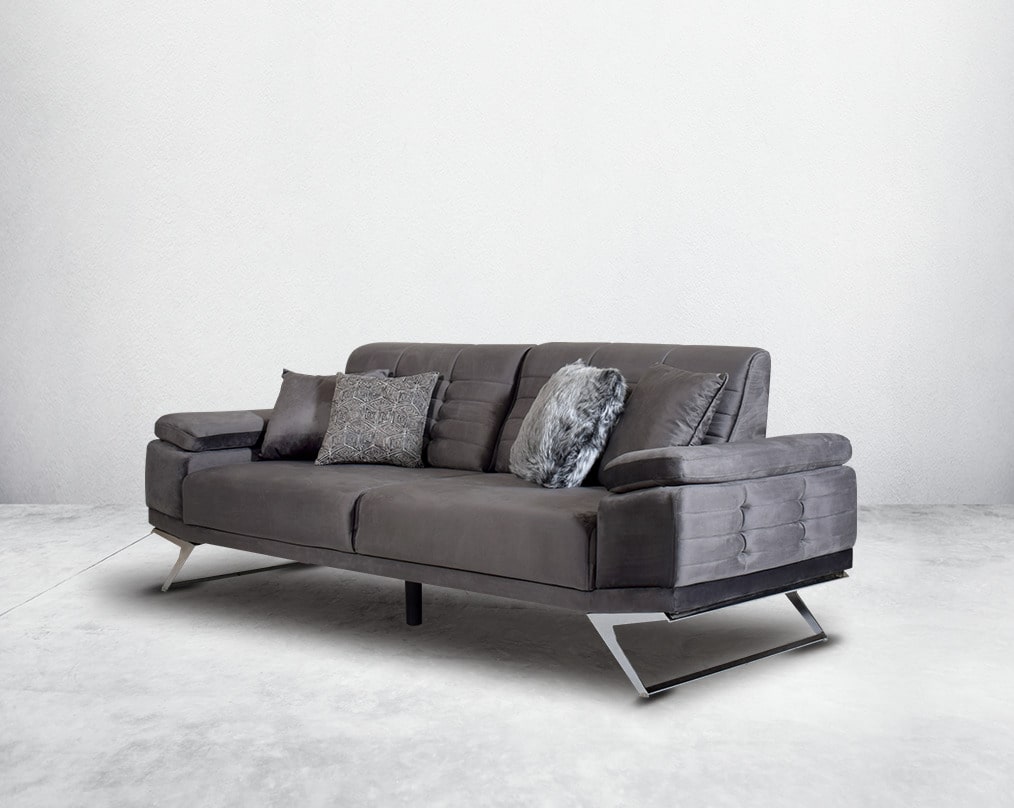 This elegant and sophisticated sofa upholstered in fabric with clean lines, straight shelter arms softened by subtle curves in modern classic design. Horizontal channel quilting is an outstanding design detailed with high gloss stainless steel base.