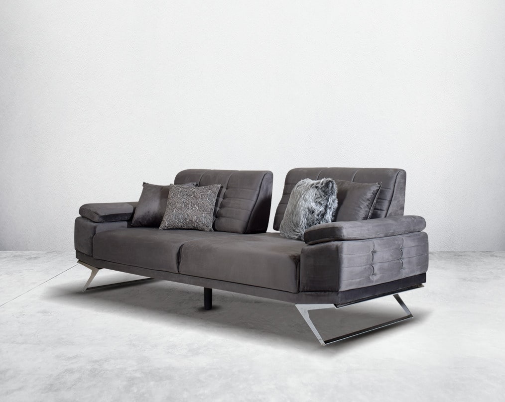 This elegant and sophisticated sofa upholstered in fabric with clean lines, straight shelter arms softened by subtle curves in modern classic design. Horizontal channel quilting is an outstanding design detailed with high gloss stainless steel base.