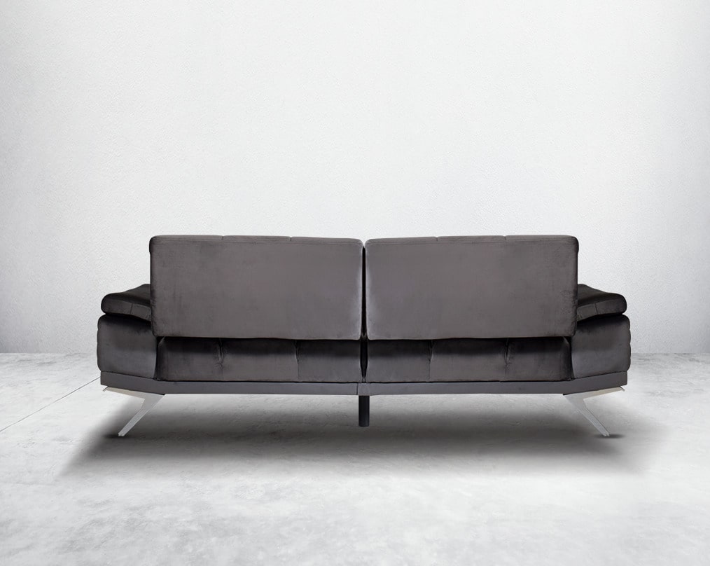 This elegant and sophisticated sofa upholstered in fabric with clean lines, back  shelter arms softened by subtle curves in modern classic design. Horizontal channel quilting is an outstanding design detailed with high gloss stainless steel base.