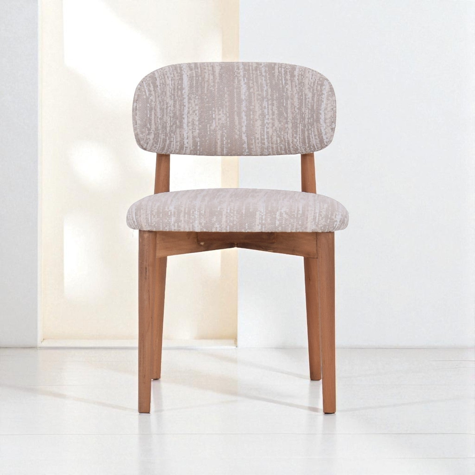 Chair with gray cushioned seat and backrest on a white background