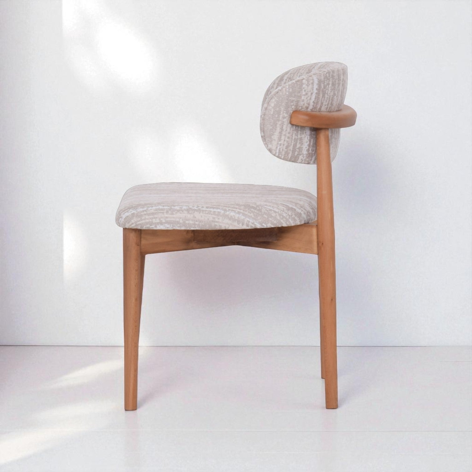 Chair with wooden frame and gray cushioned seat and backrest on a white background