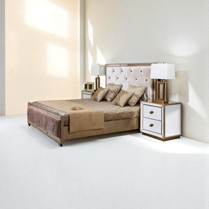 Elegant king-size bed with a tufted white headboard, tan bedding, matching side tables, and modern lamps in a bright, minimalist bedroom.