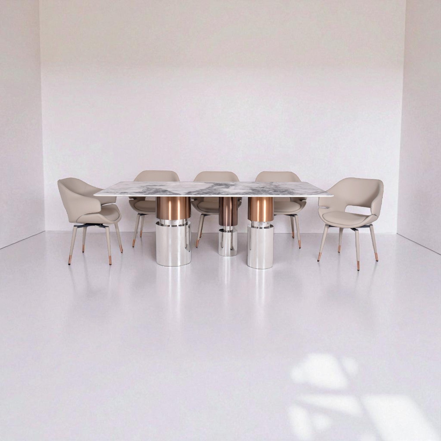 Modern dining table with marble top and metallic legs in a minimalistic setting