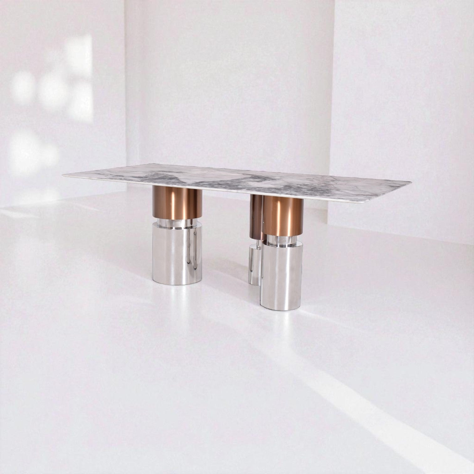 Modern table with marble top and metallic legs on a white background