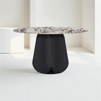 Modern table with a marble top and black base on a white background