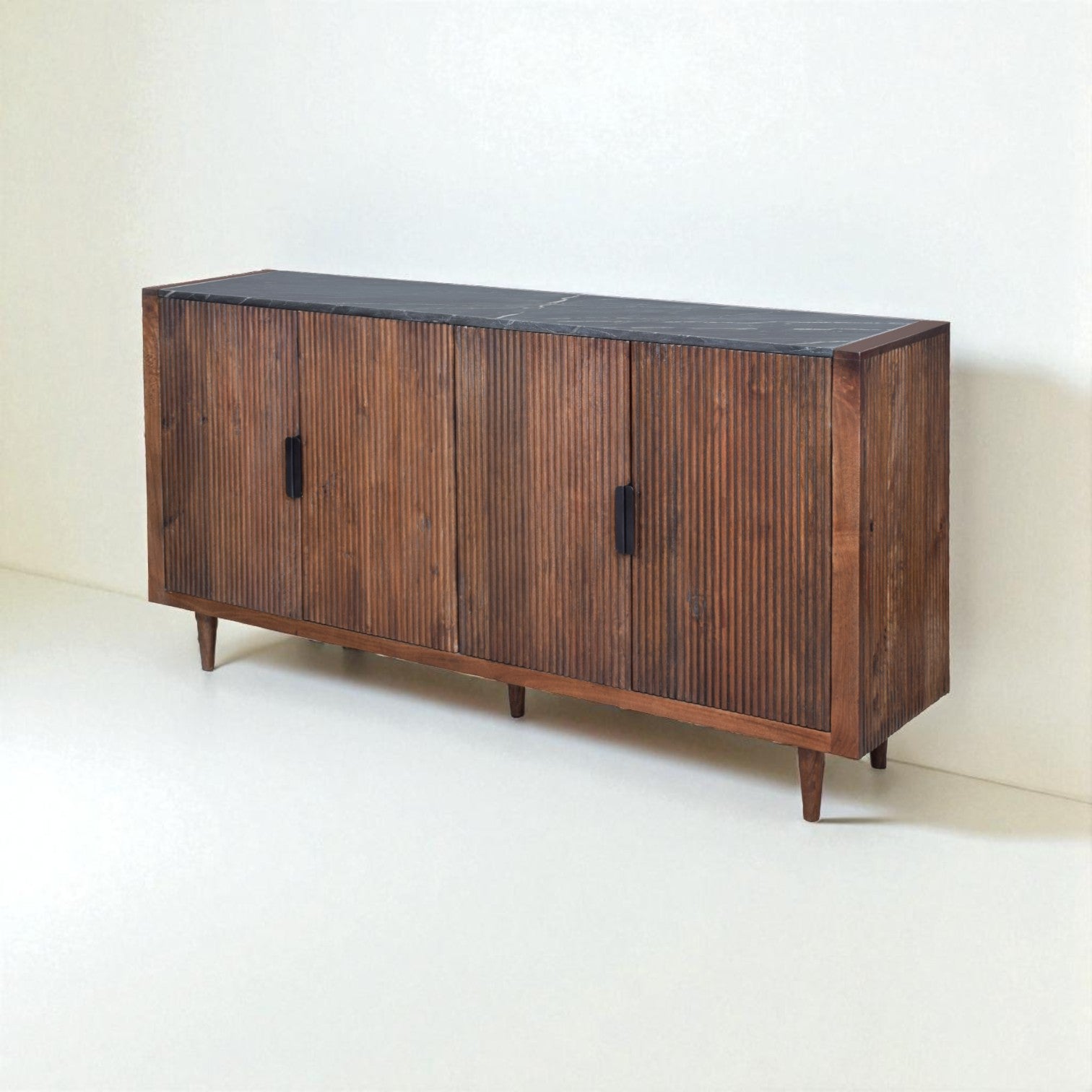 Wooden sideboard with black top on a white background