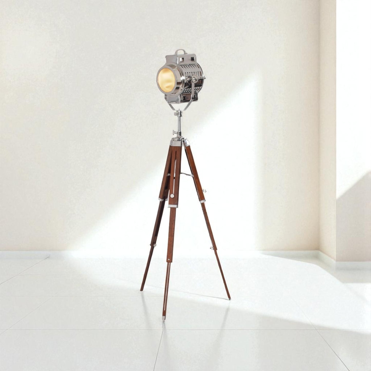 Vintage-style floor lamp with wooden tripod base on a white background