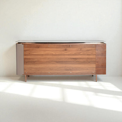 Wooden sideboard with metal accents on a white background