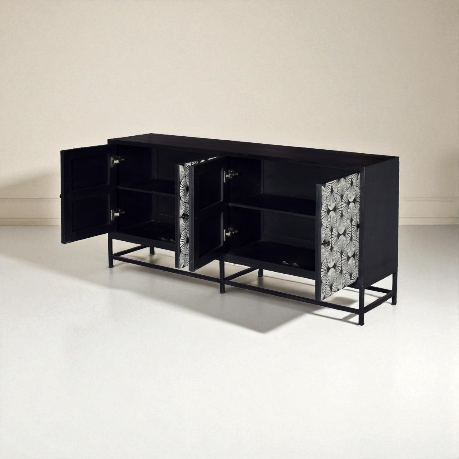 Black cabinet with patterned doors on a white floor and beige wall