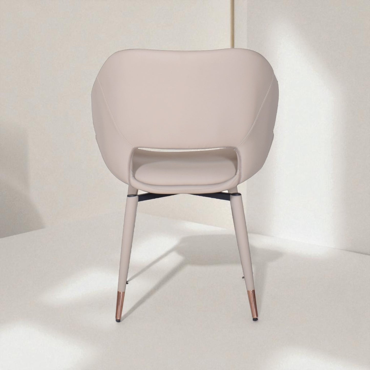 Beige chair with metallic legs on a white background