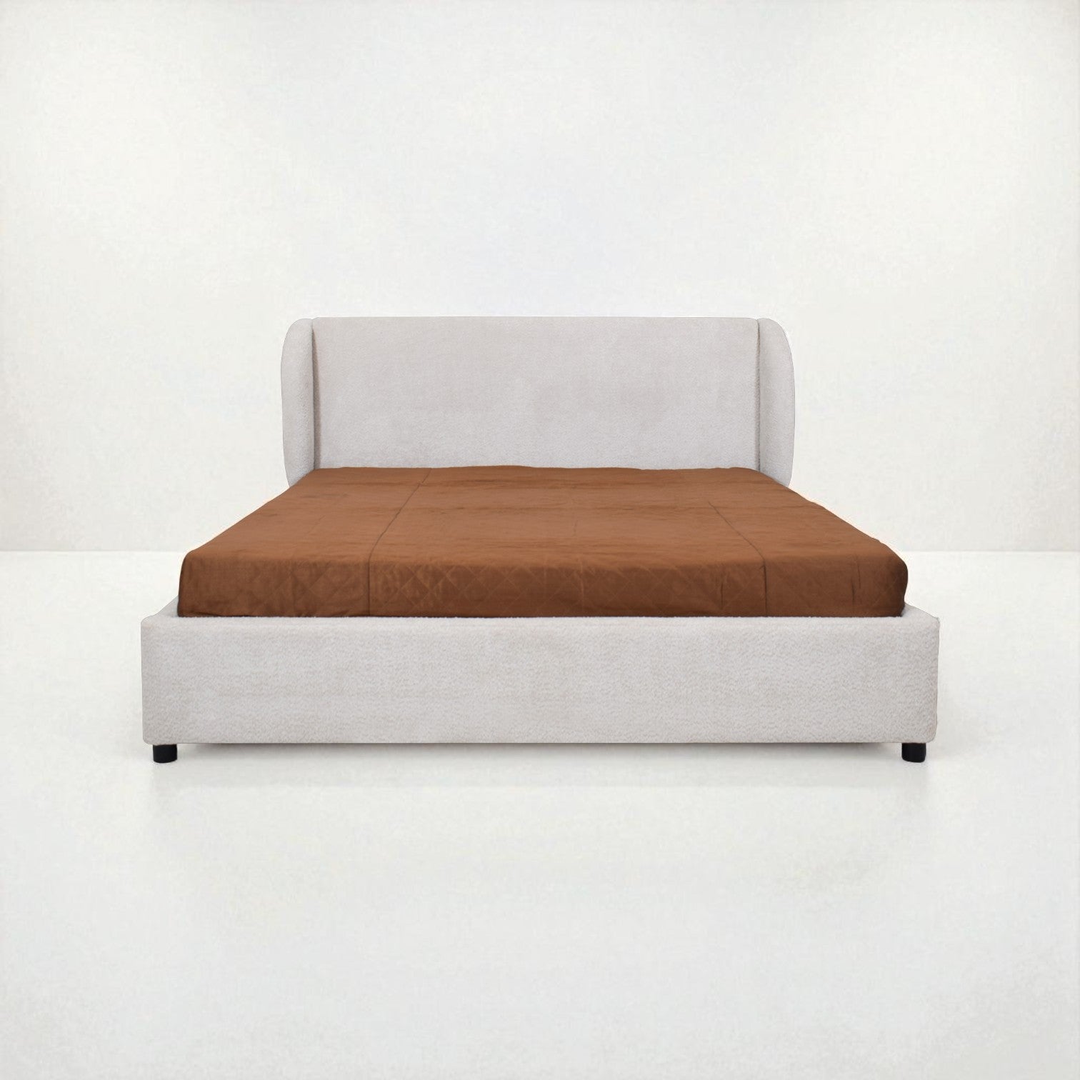 Bed with brown mattress and white frame on a white background